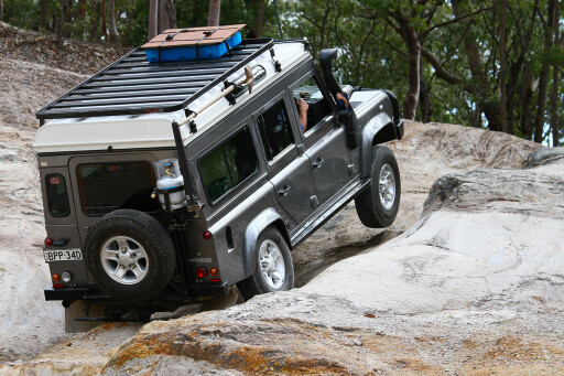 Land Rover Defender custom camper uphill.jpg