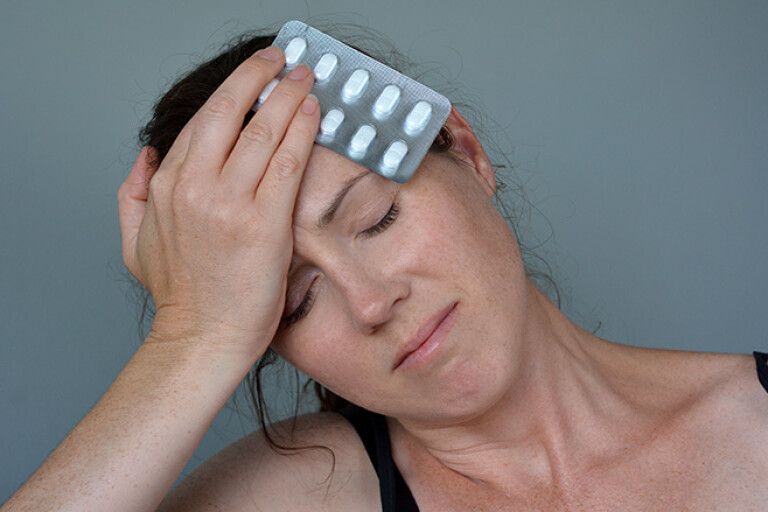 Woman headache motion sickness