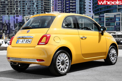 Yellow -Fiat -500-rear -side