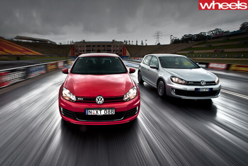 Volkswagen -Golf -GTi -vs -GTD-driving -highway