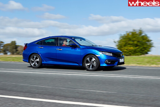 Honda Civic RS test driving side-on