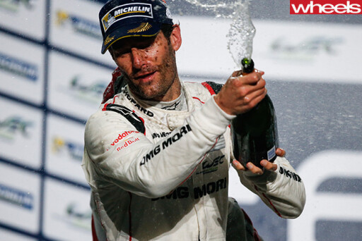 Mark -Webber -celebrates -champagne -podium