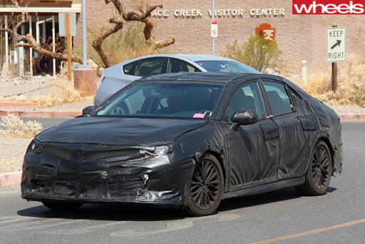 Toyota -Camry -side -front -driving
