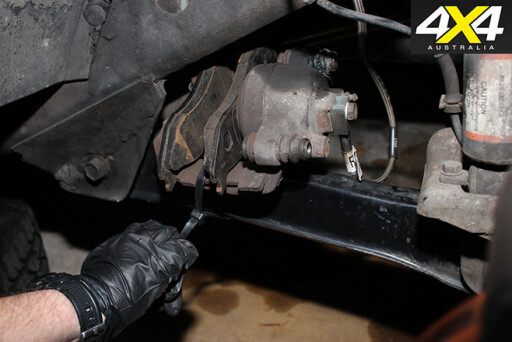 How to remove brake calipers and secure wire